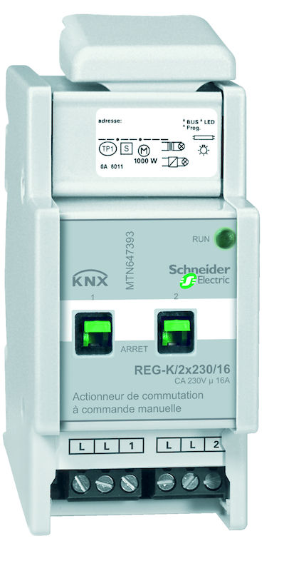 Schneider Electric KNX-schakelaar, grijs rechthoekig apparaat met groene en zwarte knoppen, duidelijke markeringen aan de voorkant.
